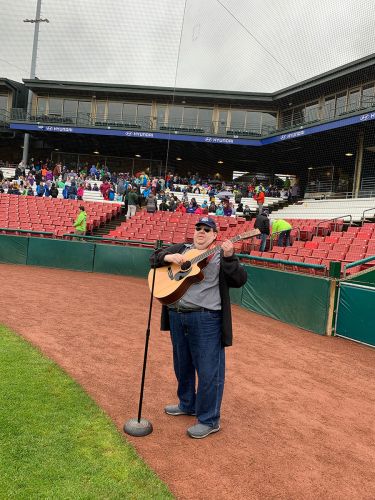 Joey performing for Kane County Cougars